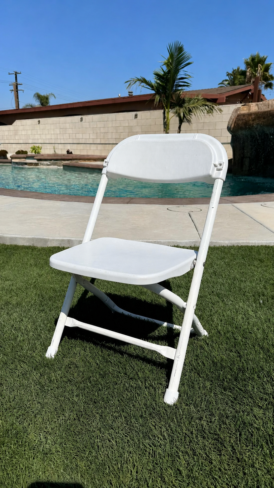 Kids Regular White Folding Chair available from AJ's Party Rentals