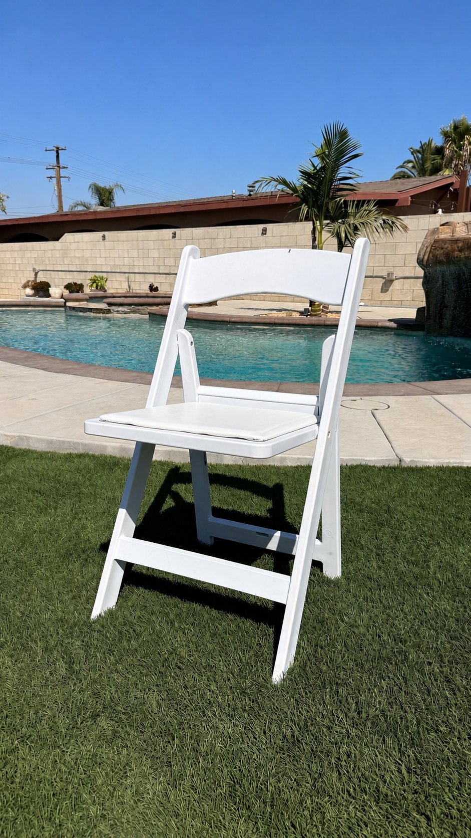 White Resin Folding Chair available from AJ's Party Rentals
